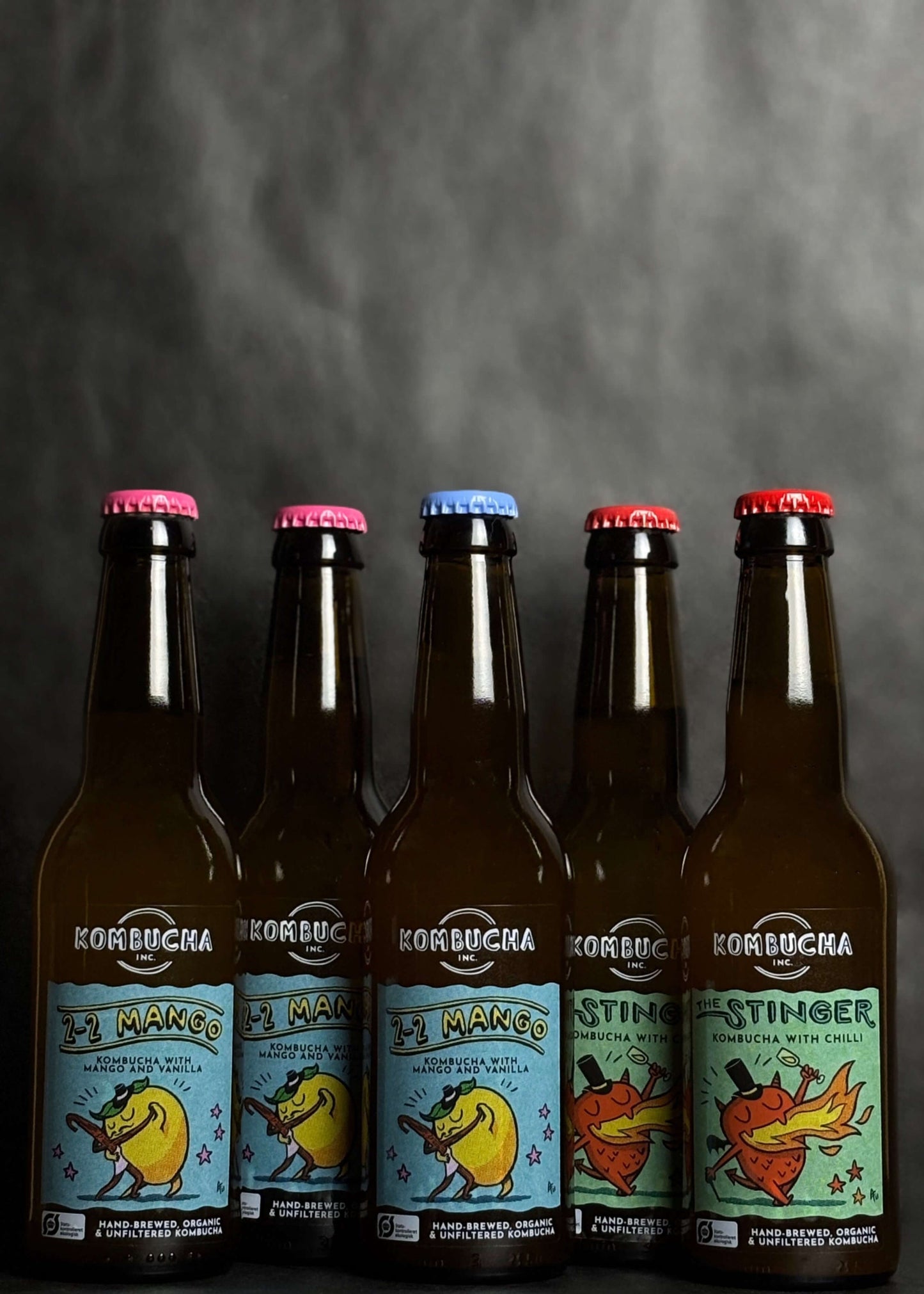 Kombucha Inc. five-pack mango chili bundle, featuring a bold blend of tropical mango and spicy chili in handcrafted, low-alcohol kombucha made with high-quality ingredients for a unique, flavorful experience.
