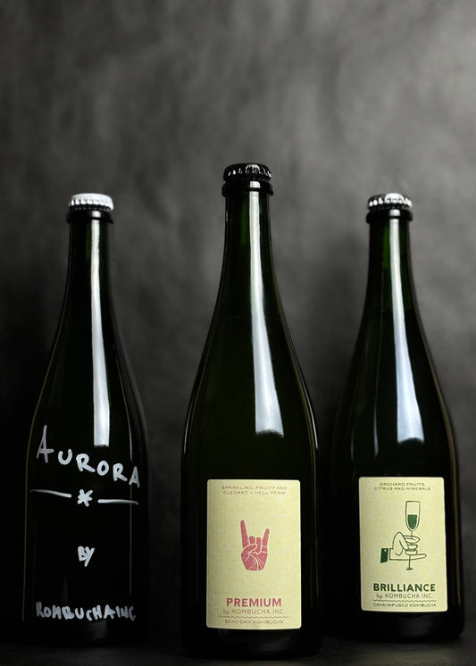 Kombucha Inc. The Signature Series bundle featuring semi-dry, yuzu, and cava-infused kombuchas, offering a refined selection of low-alcohol wine alternatives crafted with high-quality ingredients. Each flavor delivers a bold, sophisticated experience, perfect for those seeking a unique and elegant drink option.