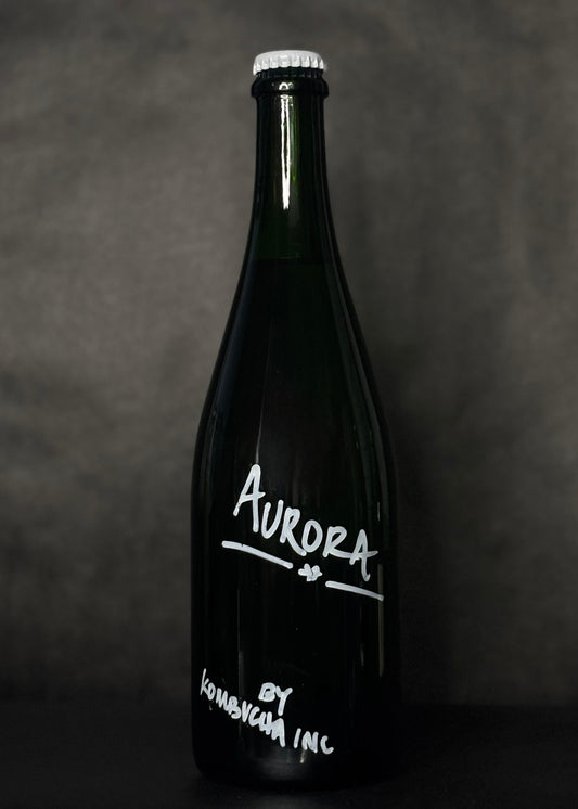 Kombucha Inc. Yuzu Aurora, an organic low-alcohol kombucha made with high-quality ingredients, offering a bold and unique flavor profile. A craft beverage alternative to traditional alcoholic drinks, perfect for those seeking a sophisticated and bright option.